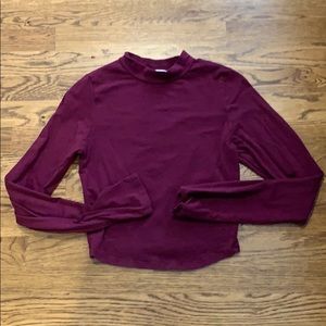 Cropped maroon long sleeve.